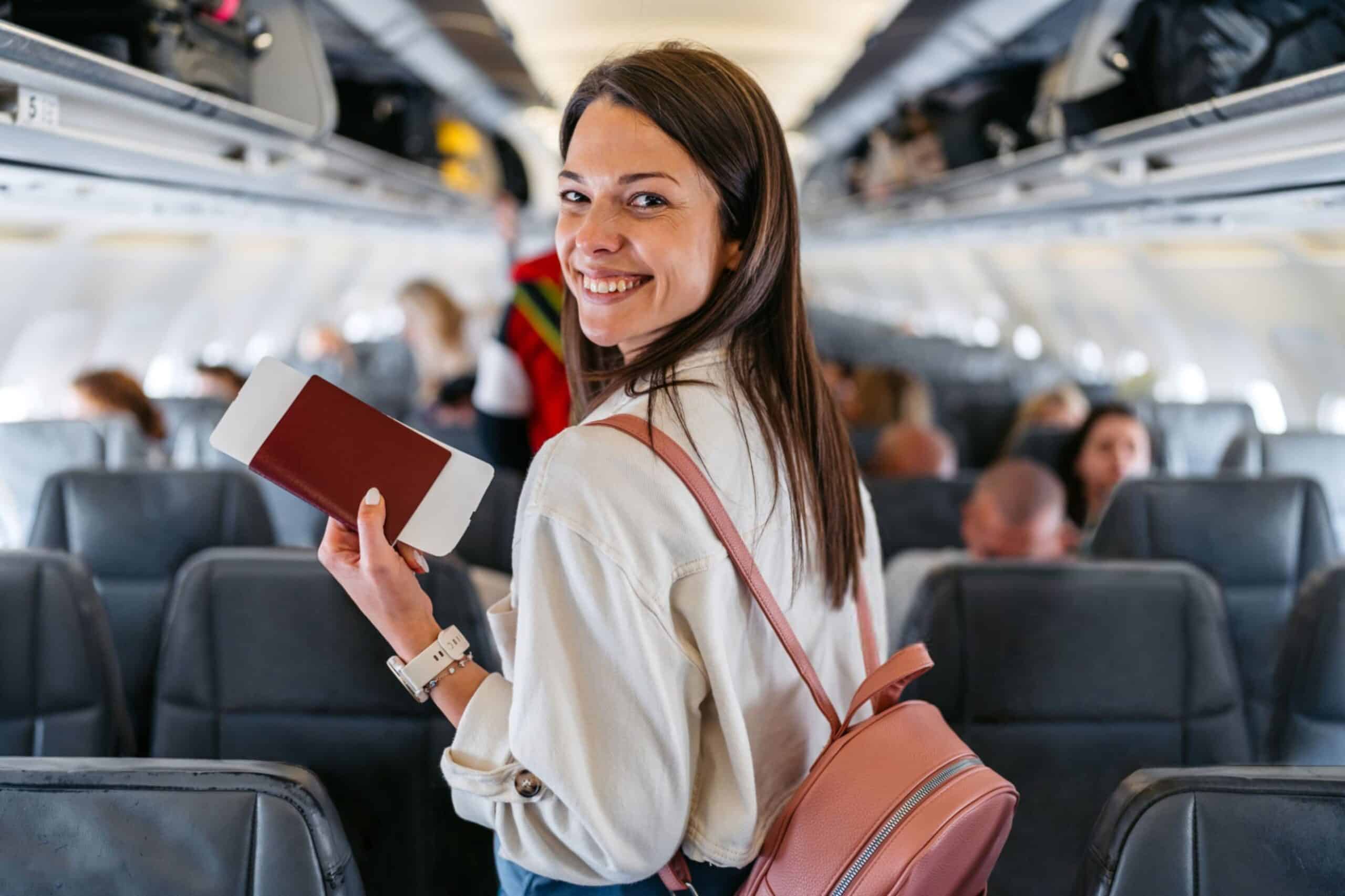 Young Woman Boarding An Airplane scaled